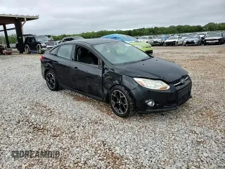 2013 Ford Focus SE z VIN 1FADP3F24DL216824, wystawiony jako Copart lot #52142715 z przebiegiem 149 611 mil mil oraz Szkoda całkowita • Salvage title. Historia ofert i sprzedaży dostępna na DreamBid. Obrazek 14.