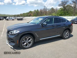 2020 BMW X4 xDrive30i with VIN 5UX2V1C03L9C80154, listed as a Copart auction lot 58655275 with 27,267 mi miles and Salvage title. Bid and sale history available at DreamBid. Image 1.