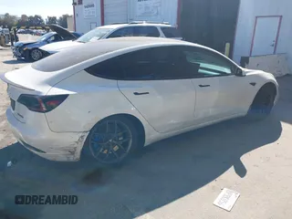 2020 Tesla Model 3 Standard Range Plus with VIN 5YJ3E1EA1LF659765, listed as a IAAI auction lot 41834411 with 42,433 mi miles and . Bid and sale history available at carsss.com. Image 4.