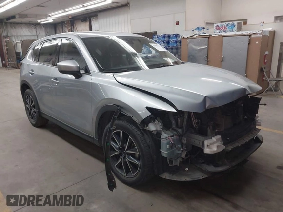 2018 Mazda CX-5 Grand Touring with VIN JM3KFBDM7J0316892, listed as a IAAI auction lot 41885705 with 90,386 mi miles. Bid and sale history available at carsss.com. Image 1.