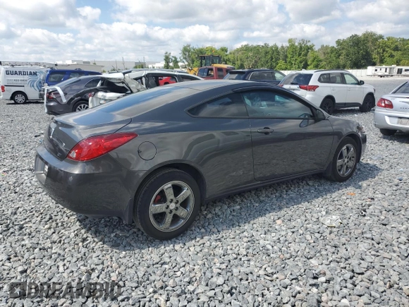 2007 Pontiac G6 GT with VIN 1G2ZH18NX74127920, listed as a Copart auction lot 52950365 with 127,428 mi miles and Salvage title. Bid and sale history available at DreamBid. Image 3.