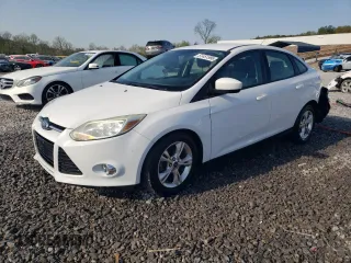 2012 Ford Focus SE with VIN 1FAHP3F27CL182474, listed as a Copart auction lot 51451595 with 122,199 mi miles and Salvage Title. Bid and sale history available at DreamBid. Image 1.