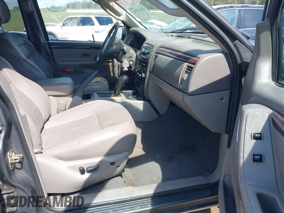 2002 Jeep Grand Cherokee Limited with VIN 1J4GW58J02C163931, listed as a IAAI auction lot 42632552 with 228,955 mi miles and . Bid and sale history available at DreamBid. Image 5.