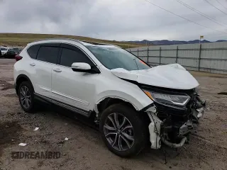 2020 Honda CR-V Touring z VIN 7FARW2H96LE000955, wystawiony jako Copart lot #51335415 z przebiegiem 37 322 mil mil oraz Szkoda całkowita • Salvage title. Historia ofert i sprzedaży dostępna na DreamBid. Obrazek 12.