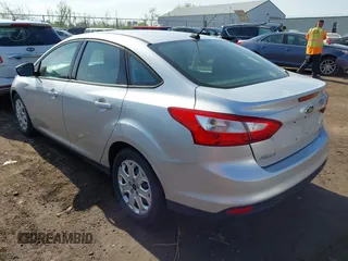2012 Ford Focus SE with VIN 1FAHP3F20CL372391, listed as a IAAI auction lot 42100970 with 126,112 mi miles and . Bid and sale history available at DreamBid. Image 3.