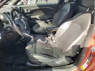 2013 MINI Coupe S z VIN WMWSX3C59DT466802, wystawiony jako Copart lot #56860965 z przebiegiem 88 053 mil mil oraz Szkoda całkowita • Salvage title. Historia ofert i sprzedaży dostępna na DreamBid. Obrazek 7.