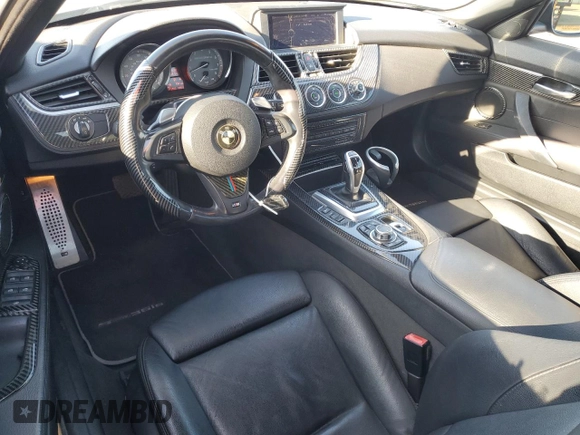 2011 BMW Z4 sDrive35is with VIN WBALM1C58BE393909, listed as a Copart auction lot 89218305 with 112,502 mi miles and Salvage title. Bid and sale history available at DreamBid. Image 8.