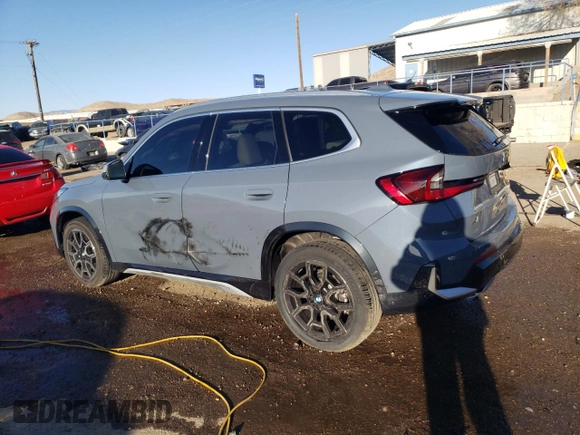 2024 BMW X1 xDrive28i with VIN WBX73EF00R5Z58004, listed as a Copart auction lot 49554055 with 4,053 mi miles and Salvage title. Bid and sale history available at DreamBid. Image 2.