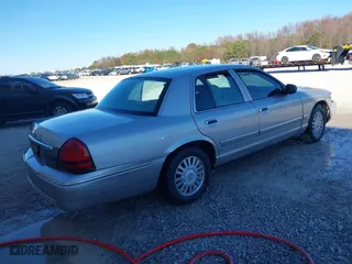 2007 Mercury Grand Marquis LS with VIN 2MEFM75V87X628541, listed as a IAAI auction lot 41051994 with 183,363 mi miles. Bid and sale history available at carsss.com. Image 4.