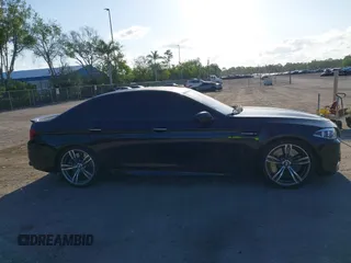 2014 BMW M5 z VIN WBSFV9C54ED593281, wystawiony jako IAAI lot #42063656 z przebiegiem 104 517 mil mil oraz . Historia ofert i sprzedaży dostępna na DreamBid. Obrazek 13.