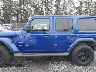 2019 Jeep Wrangler Unlimited Sahara with VIN 1C4HJXEG2KW609315, listed as a IAAI auction lot 41144404 with 55,266 mi miles and . Bid and sale history available at DreamBid. Image 14.
