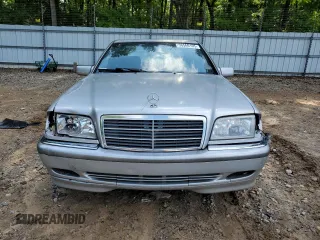 1999 Mercedes-Benz C 230/260/280/320 with VIN WDBHA24G4XA749633, listed as a Copart auction lot 56560105 with 221,306 mi miles and Salvage title. Bid and sale history available at DreamBid. Image 5.