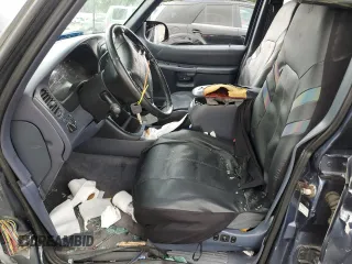 1998 Ford Explorer XL z VIN 1FMZU34EXWZA13244, wystawiony jako Copart lot #54456095 z przebiegiem 192 527 mil mil oraz Szkoda całkowita • Salvage title. Historia ofert i sprzedaży dostępna na DreamBid. Obrazek 7.