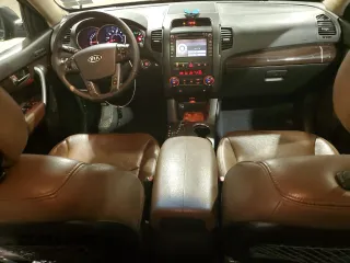 2012 Kia Sorento EX with VIN 5XYKUDA27CG281054, listed as a Copart auction lot 46639705 with 129,816 mi miles and Salvage Title. Bid and sale history available at carsss.com. Image 8.