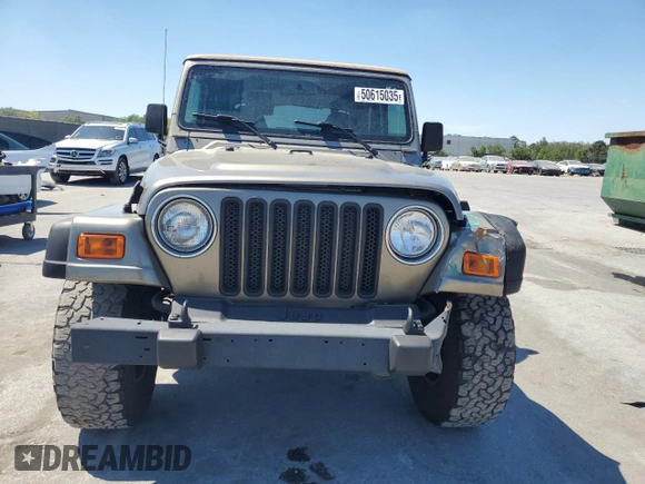 2002 Jeep Wrangler Sport with VIN 1J4FA49S72P765939, listed as a Copart auction lot 50615035 with 210,516 mi miles and Salvage Title. Bid and sale history available at carsss.com. Image 5.