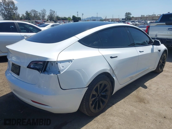 2022 Tesla Model 3 Long Range with VIN 5YJ3E1EB1NF289719, listed as a IAAI auction lot 41968273 with 73,368 mi miles and . Bid and sale history available at DreamBid. Image 4.
