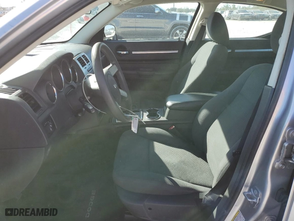 2010 Dodge Charger with VIN 2B3CA4CD2AH179057, listed as a Copart auction lot 87958155 with 130,505 mi miles and Salvage Title. Bid and sale history available at carsss.com. Image 7.