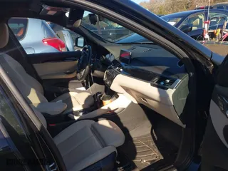 2019 BMW X1 xDrive28i with VIN WBXHT3C50K5L35416, listed as a IAAI auction lot 41195144 with 75,643 mi miles. Bid and sale history available at carsss.com. Image 5.