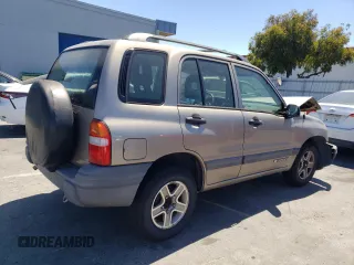 2002 Chevrolet Tracker z VIN 2CNBJ13C026951435, wystawiony jako Copart lot #57782784 z przebiegiem 132 279 mil mil oraz Szkody całkowita. Historia ofert i sprzedaży dostępna na DreamBid. Obrazek 3.