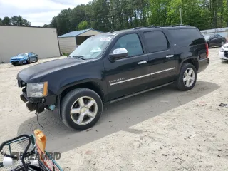 2014 Chevrolet Suburban LTZ with VIN 1GNSKKE77ER126564, listed as a Copart auction lot 57600375 with 166,828 mi miles and Salvage title. Bid and sale history available at DreamBid. Image 1.