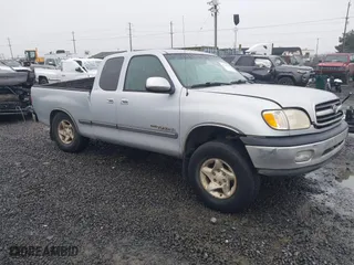 2000 Toyota Tundra SR5 with VIN 5TBBT4416YS094123, listed as a IAAI auction lot 41512147 with 263,330 mi miles. Bid and sale history available at carsss.com. Image 1.