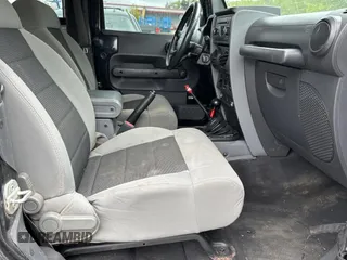 2008 Jeep Wrangler X with VIN 1J4FA24168L582227, listed as a Copart auction lot 58219065 with 98,284 mi miles and Salvage title. Bid and sale history available at DreamBid. Image 5.