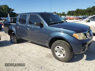 2015 Nissan Frontier Pro-4X with VIN 1N6AD0EV7FN739064, listed as a Copart auction lot 71785524 with 137,133 mi miles and Salvage title. Bid and sale history available at DreamBid. Image 4.