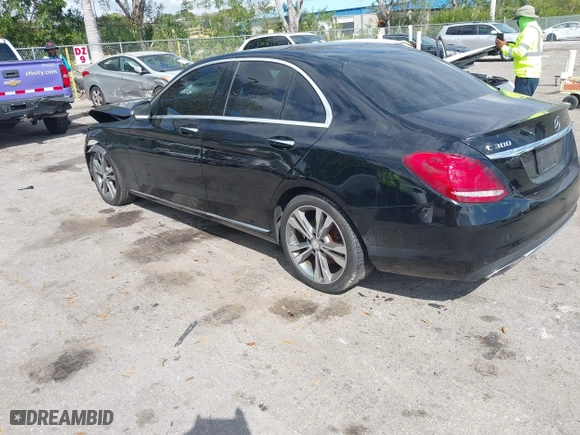 2015 Mercedes-Benz C-Class C 300 with VIN 55SWF4JB8FU062030, listed as a IAAI auction lot 41593649 with 123,196 mi miles. Bid and sale history available at carsss.com. Image 3.
