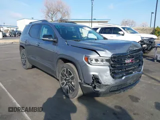 2021 GMC Acadia SLE with VIN 1GKKNKLA4MZ168921, listed as a IAAI auction lot 41562602 with 26,370 mi miles and . Bid and sale history available at DreamBid. Image 1.