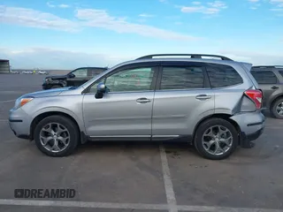 2016 Subaru Forester 2.5i Touring with VIN JF2SJAXC7GH455601, listed as a IAAI auction lot 41876613 with 133,976 mi miles. Bid and sale history available at carsss.com. Image 15.