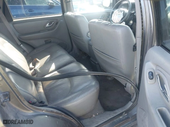2002 Mazda Tribute LX with VIN 4F2YU08142KM18539, listed as a IAAI auction lot 41742104 with 230,254 mi miles. Bid and sale history available at carsss.com. Image 8.