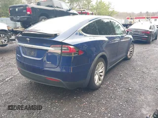 2016 Tesla Model X 70D with VIN 5YJXCBE20GF016173, listed as a IAAI auction lot 41809725 with 116,198 mi miles. Bid and sale history available at carsss.com. Image 4.