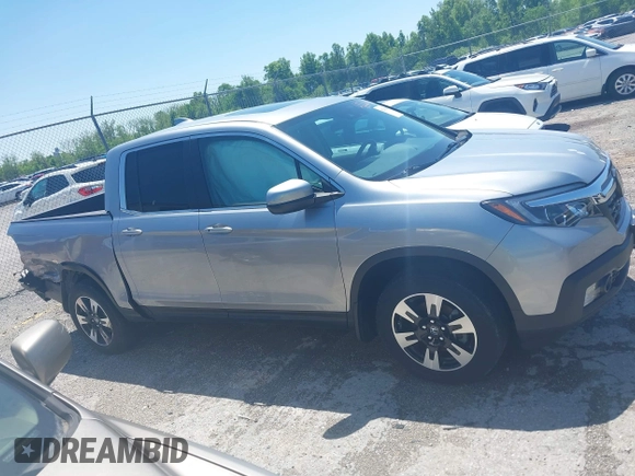 2020 Honda Ridgeline RTL with VIN 5FPYK3F5XLB019296, listed as a IAAI auction lot 42204290 with 48,197 mi miles and . Bid and sale history available at DreamBid. Image 13.