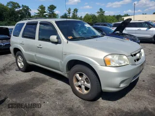 2005 Mazda Tribute i with VIN 4F2YZ92Z55KM53695, listed as a Copart auction lot 61494224 with 144,911 mi miles and Salvage Title. Bid and sale history available at carsss.com. Image 4.