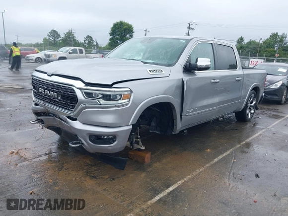 2023 Ram 1500 Limited with VIN 1C6SRFHT1PN531759, listed as a IAAI auction lot 42323882 with 47,809 mi miles and . Bid and sale history available at DreamBid. Image 6.