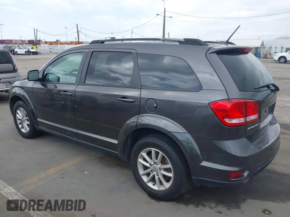 2017 Dodge Journey SXT with VIN 3C4PDCBG3HT618930, listed as a IAAI auction lot 41956400 with 106,185 mi miles and . Bid and sale history available at carsss.com. Image 3.