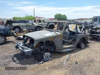 2014 Jeep Wrangler Rubicon with VIN 1C4BJWCG6EL126340, listed as a IAAI auction lot 42654467 with Not provided miles and . Bid and sale history available at DreamBid. Image 2.