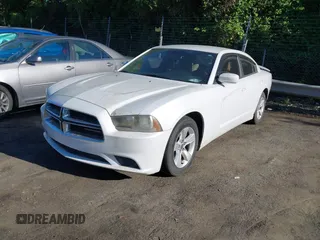 2013 Dodge Charger SE z VIN 2C3CDXBG9DH543633, wystawiony jako IAAI lot #42348195 z przebiegiem 139 059 mil mil oraz . Historia ofert i sprzedaży dostępna na DreamBid. Obrazek 2.
