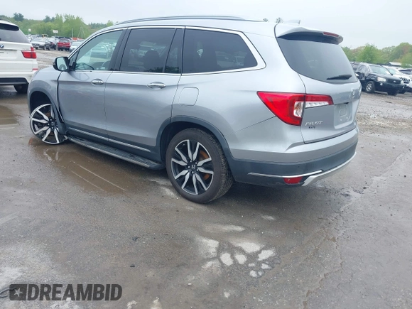 2020 Honda Pilot Touring 8-Passenger z VIN 5FNYF6H91LB042626, wystawiony jako IAAI lot #42249440 z przebiegiem 57 429 mil mil oraz . Historia ofert i sprzedaży dostępna na DreamBid. Obrazek 3.