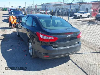 2014 Ford Focus SE with VIN 1FADP3F22EL207587, listed as a IAAI auction lot 41818555 with 119,811 mi miles. Bid and sale history available at carsss.com. Image 3.