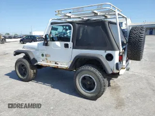1999 Jeep Wrangler Sport with VIN 1J4FY19SXXP464096, listed as a Copart auction lot 61233105 with 167,350 mi miles and Clean title. Bid and sale history available at DreamBid. Image 2.