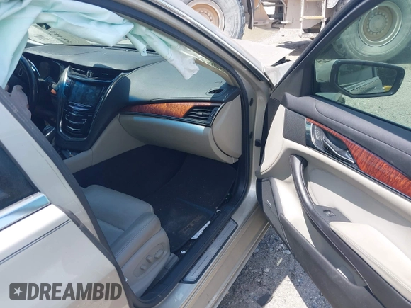 2014 Cadillac CTS Luxury RWD z VIN 1G6AR5SX4E0141195, wystawiony jako IAAI lot #42144565 z przebiegiem 80 267 mil mil oraz . Historia ofert i sprzedaży dostępna na DreamBid. Obrazek 5.