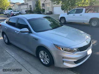 2016 Kia Optima LX with VIN 5XXGT4L38GG022940, listed as a Copart auction lot 54086785 with 145,038 mi miles and Clean Title. Bid and sale history available at carsss.com. Image 1.
