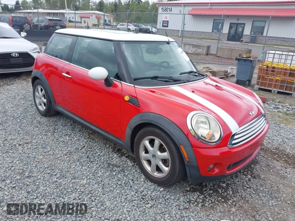 2010 MINI Hardtop with VIN WMWMF3C51ATZ65259, listed as a IAAI auction lot 42248896 with 106,216 mi miles and . Bid and sale history available at DreamBid. Image 1.