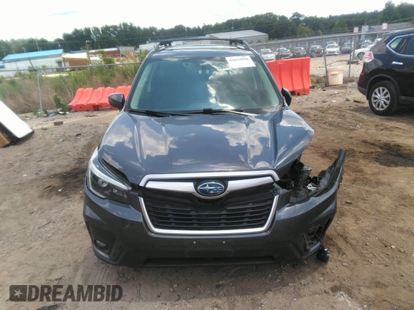 2021 Subaru Forester Premium with VIN JF2SKAFC1MH437721, listed as a IAAI auction lot 42633556 with 119,574 mi miles and . Bid and sale history available at DreamBid. Image 12.
