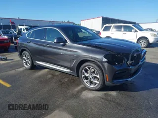 2020 BMW X4 xDrive30i with VIN 5UX2V1C07L9B83698, listed as a IAAI auction lot 41860487 with 51,891 mi miles. Bid and sale history available at carsss.com. Image 1.