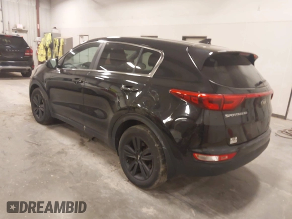 2018 Kia Sportage LX with VIN KNDPM3AC6J7417371, listed as a IAAI auction lot 41879390 with 112,944 mi miles and . Bid and sale history available at carsss.com. Image 3.