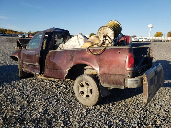 2001 Ford F-150 XL with VIN 1FTRF17L31NA34241, listed as a Copart auction lot 76045554 with Not provided miles and Salvage title. Bid and sale history available at DreamBid. Image 2.