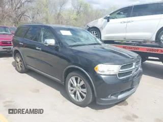 2011 Dodge Durango Crew with VIN 1D4RE4GG5BC635139, listed as a IAAI auction lot 41921902 with 249,590 mi miles and . Bid and sale history available at carsss.com. Image 1.