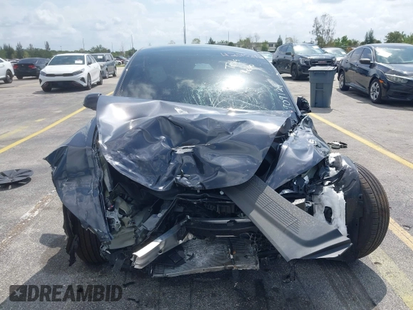 2025 Tesla Model 3 Long Range z VIN 5YJ3E1EBXSF909124, wystawiony jako IAAI lot #42015297 z przebiegiem Nie podano mil oraz . Historia ofert i sprzedaży dostępna na DreamBid. Obrazek 6.